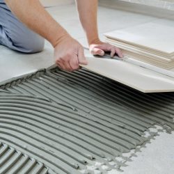 Ron is tiling a countertop